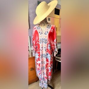 100% Rayon, kimono style robe. One size fits all.